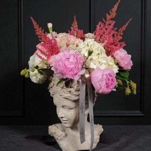 Luxury floral arrangement in a classic bust with pink peonies, hydrangeas and astilbe – elegant table centerpiece
