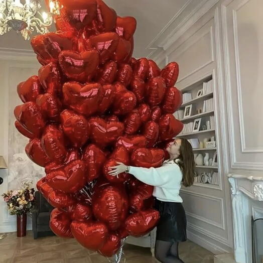 100 globos en forma de corazon
