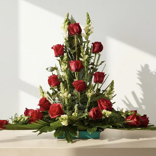 Red Elegance Centerpiece – Funeral centerpiece with red roses and snapdragons