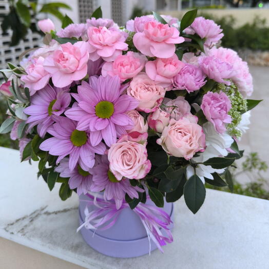 Pink flowers in a hat box