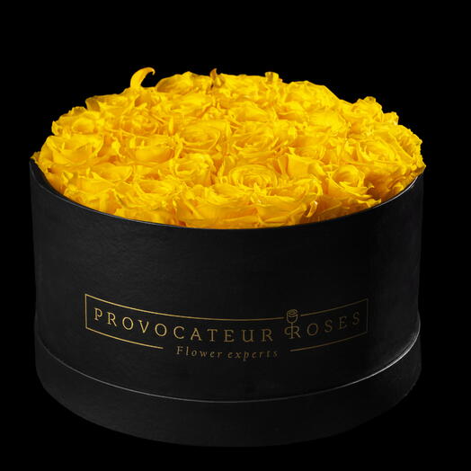 Caja redonda 30cm de rosas preservadas amarillas