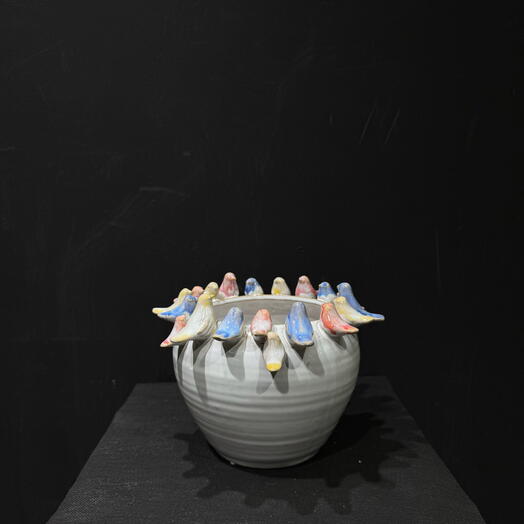 Maceta decorativa con pajaros