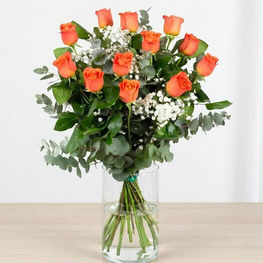 Букет із 11 помаранчевих троянд з довгими стеблами