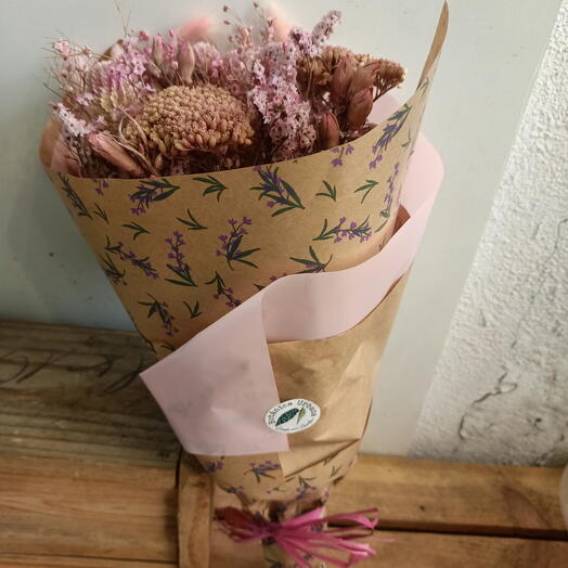 Dried flower bouquet in light pink tones