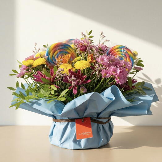 Centro Piruleta – Centro floral con margaritas y piruletas para regalar alegria y dulzura