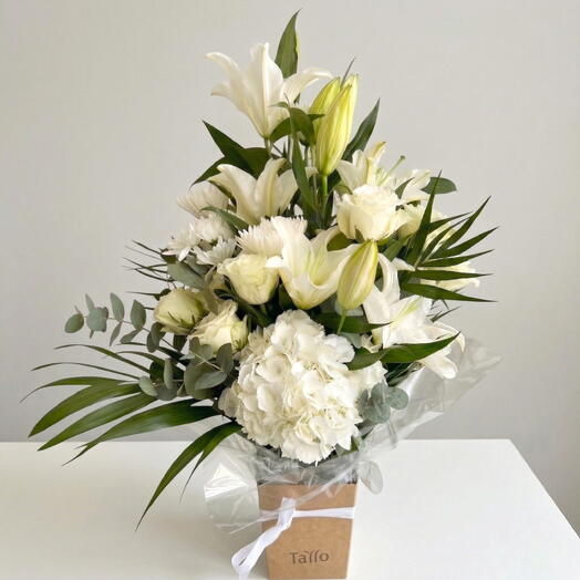 Ramo funerario en tonos blancos