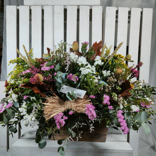Wildflower basket with mixed flowers and wheat