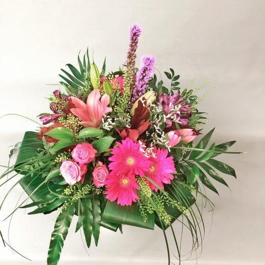 Assorted flower bouquets in pink tones