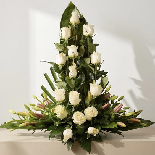 White Serenity Centerpiece – Funeral centerpiece with white roses and lilies