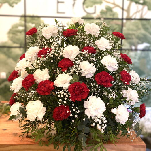 Centerpiece of red and white carnations