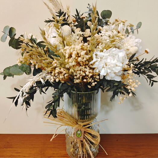 Vase avec bouquet blanc préservé