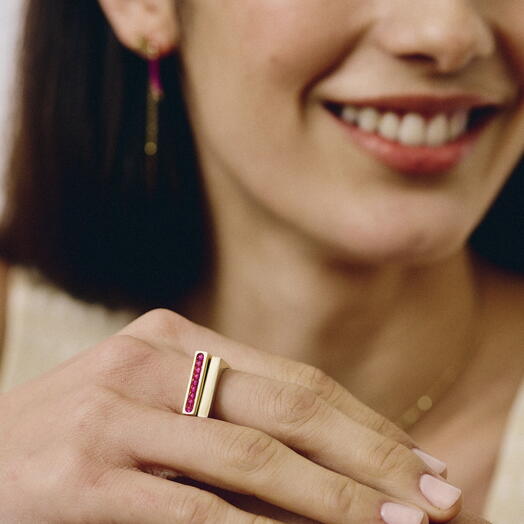 Dos sortijas rectangulares plata con bano de oro y rubelita