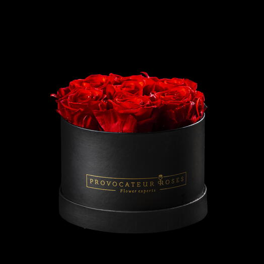 Caja redonda 16cm  de rosas preservadas roja