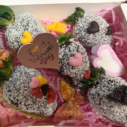 Caja de 7 fresas cubiertas en chocolate con leche