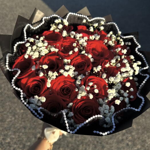 Red roses with white baby's breath