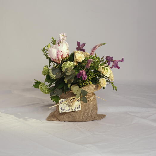 SAQUITO DE ARPILLERIA CON FLORES