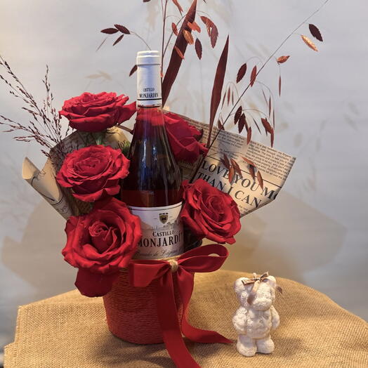 Pack roses, wine and candle